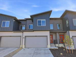 Modern home featuring an attached garage