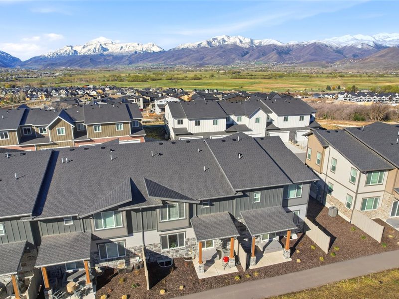 Aerial view of residential area with a mountainous background