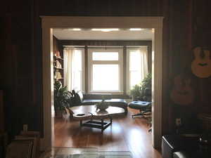 Living area featuring hardwood / wood-style floors