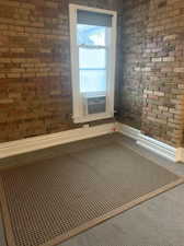 Detailed view of brick wall and carpet