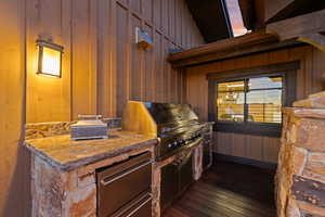 View of deck with exterior kitchen bbq & beverage fridge on deck