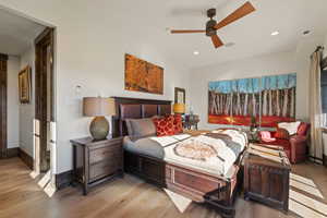 Tree Bedroom with light wood finished floors, ceiling fan, and recessed lighting