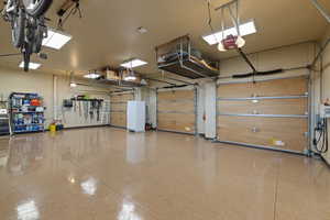 3 car heated garage with storage racks