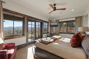 Tree Bedroom featuring light wood-type flooring, ceiling fan, access to exterior, and recessed lighting
