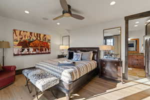 Bear Bedroom featuring light wood finished floors, recessed lighting, a ceiling fan, and connected bathroom