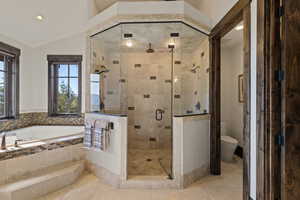 Primary Full bathroom featuring a bath, a steam shower stall, light tile patterned floors, and recessed lighting