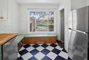 Dining room with dark flooring