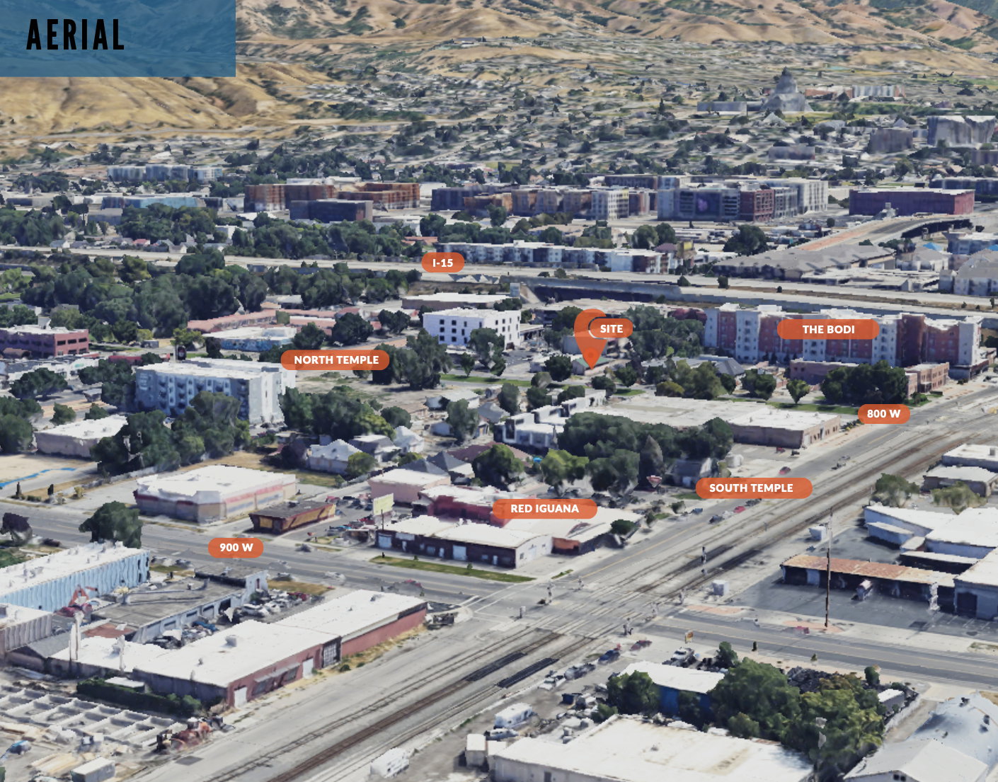 View of property location featuring nearby urban area and a mountain backdrop