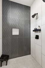 Bathroom with a tile shower