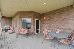 Covered deck, kitchen door access, outdoor dining space