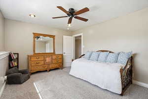 Bedroom #3 featuring a ceiling fan and carpet flooring