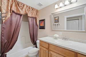 2nd Full Bathroom with vanity and shower/tub combo with curtain