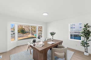 Office featuring light wood-style floors