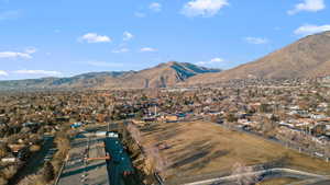 Mountain view featuring nearby suburban area