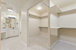 Primary Closet to Bathroom