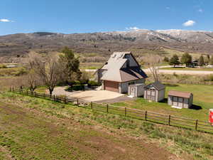 View of mountain backdrop featuring rural landscape