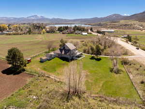 Overview of rural landscape featuring a water and mountain view