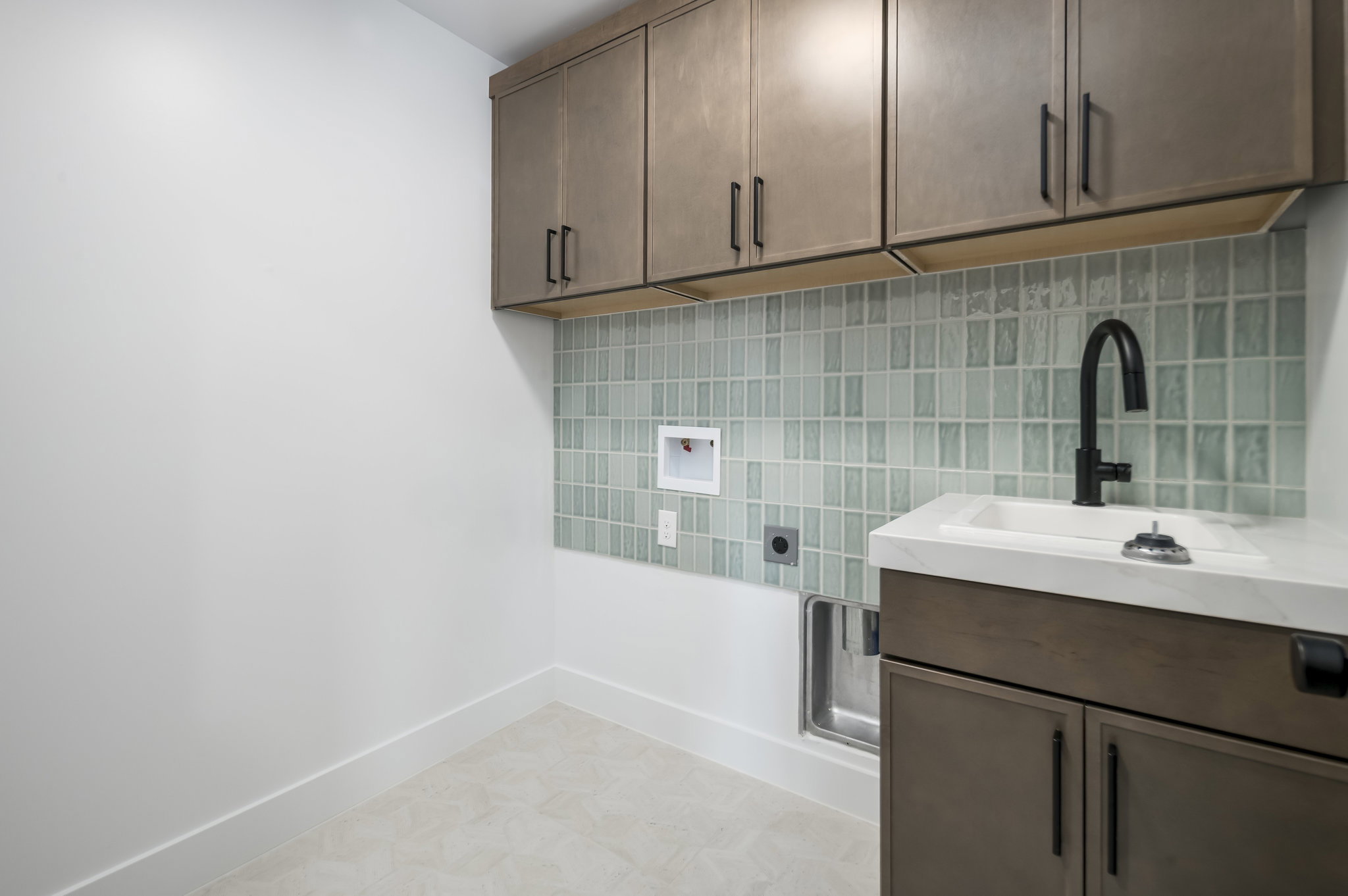 Laundry room with washer hookup, cabinet space, and hookup for an electric dryer