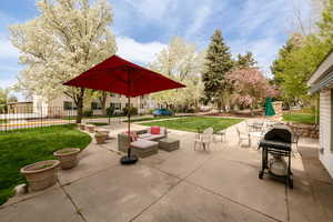View of patio / terrace featuring a grill and outdoor seating