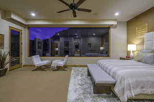 Bedroom featuring carpet floors, ceiling fan, and recessed lighting