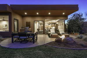 View of patio / terrace with outdoor dining area and a grill
