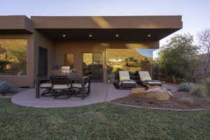 View of patio / terrace featuring outdoor dining area and grilling area