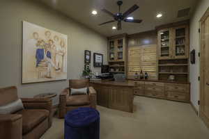 Office area with recessed lighting, light colored carpet, and a ceiling fan