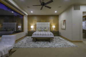 Bedroom featuring light colored carpet, recessed lighting, and a ceiling fan
