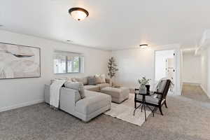 Living room with light carpet