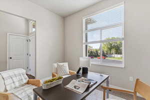 Home office featuring baseboards and wood finished floors
