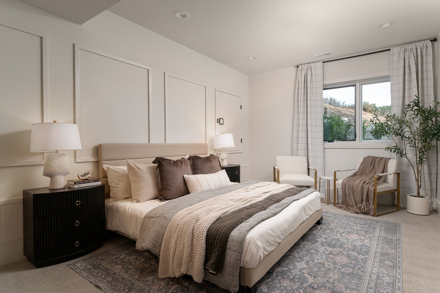 Bedroom with light carpet and recessed lighting