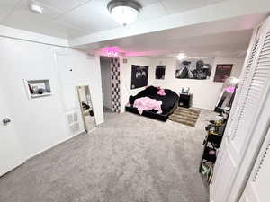 Bedroom with light carpet