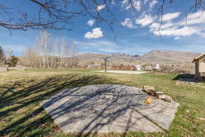 View of patio featuring a mountain view