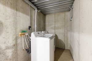 Laundry area featuring independent washer and dryer