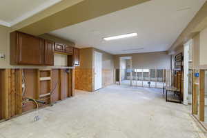 Basement featuring a wainscoted wall