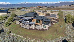 View from above of property featuring a mountainous background