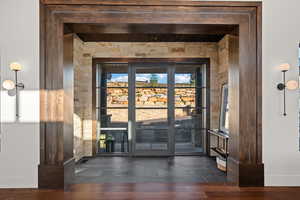 Property entrance with french doors