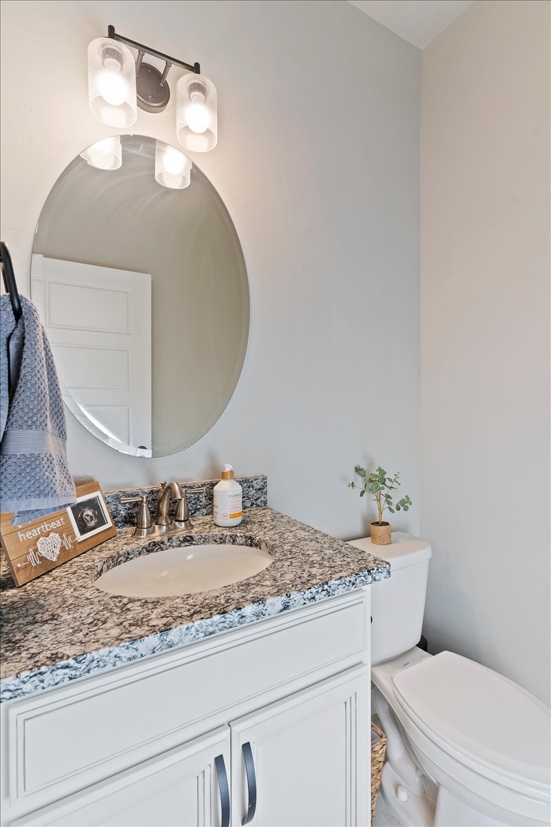 Bathroom with vanity and toilet