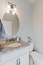 Bathroom with vanity and toilet
