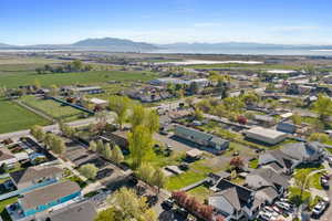 Aerial view of residential area featuring mountains