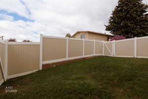 Fenced yard with a gate
