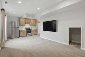 Virtual Photos: Home previously had a basement kitchen, plumbing and electrical still in place. Cabinetry and appliances were removed.