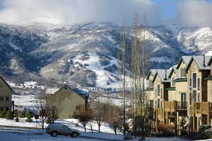 View of mountain backdrop with nearby suburban area