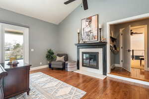 Primary bedroom sitting area with fireplace