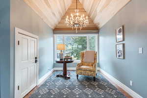 Primary bedroom sitting area near window with spectacular East views