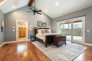 Primary bedroom featuring light wood-style flooring, access to outside, ceiling fan, and recessed lighting
