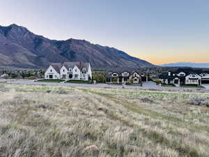View of mountain background featuring nearby suburban area