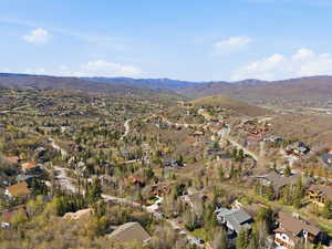 Aerial view of residential area featuring mountains
