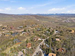 Aerial view of residential area with a mountainous background