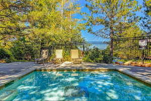 Swimming pool with a patio